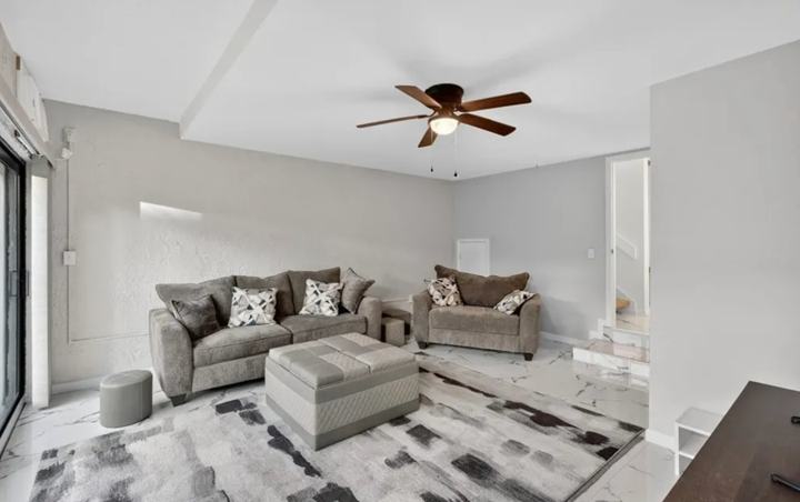 Comfortable seating area in the living room of the Marco Island snowbird rental