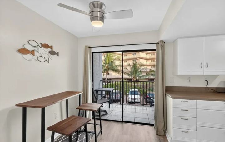 Breakfast bar seating beside the screened lanai in the Marco Island seasonal rental