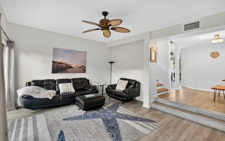 Living and dining levels of the three-level Marco Island long term rental